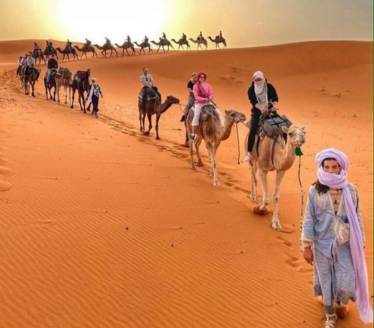camel trek in Erg Chebbi dunes Morocco