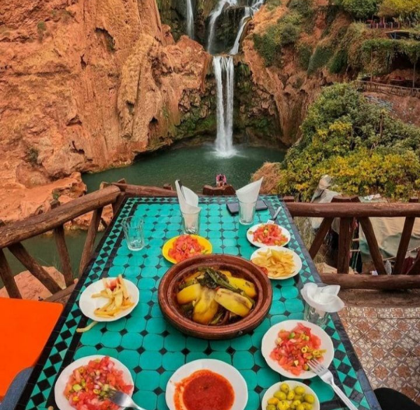 Ouzoud Waterfalls surrounded by lush greenery in Morocco